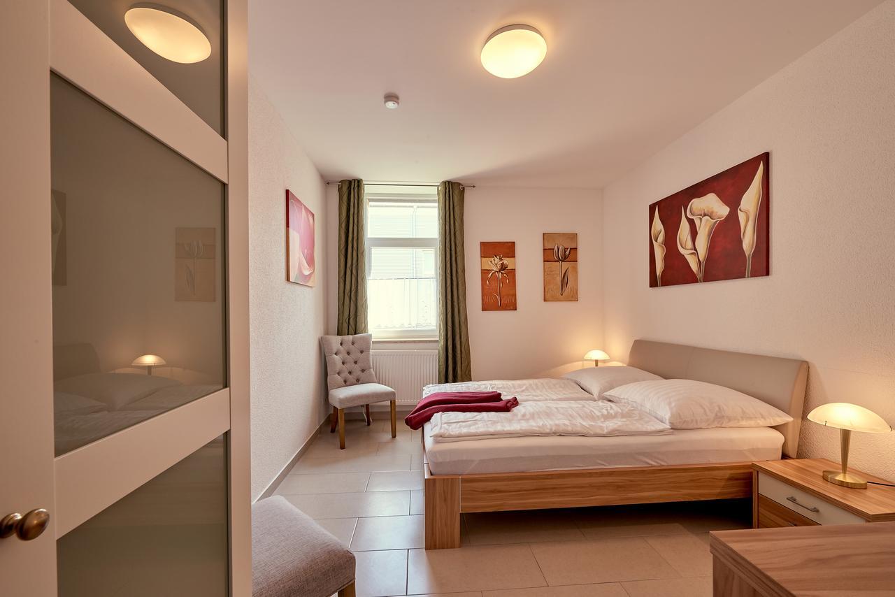 Hotel Zur Alten Stadtkellerei Leipzig Ngoại thất bức ảnh A bedroom